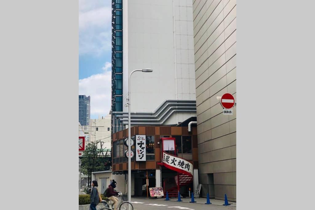 悠悠美宿 肥后桥雪霁 地铁站步行行5分钟 直达难波心斋桥5分钟内 独立卧室有厨房 肥后桥高级公寓有电梯 Osaka