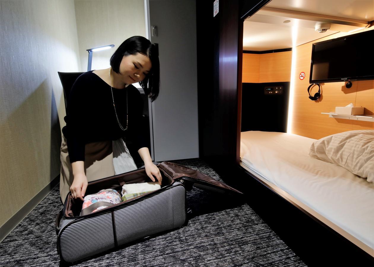Capsule hotel Tama Cabin Honmachi *